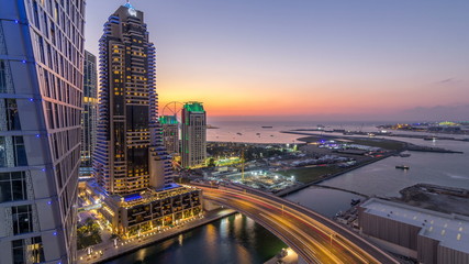 Fototapeta premium JBR and Dubai marina after sunset aerial day to night timelapse