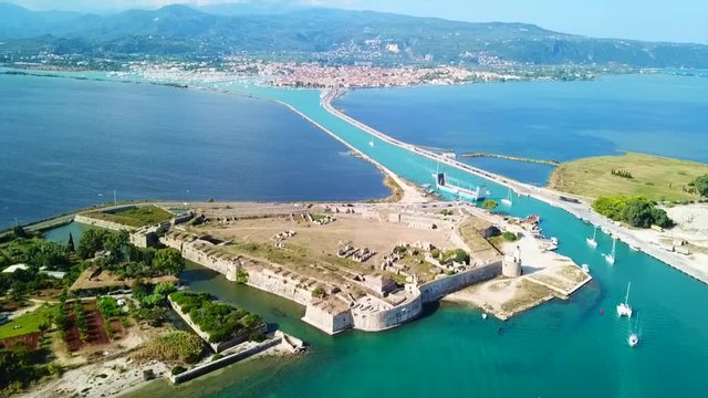 Aerial drone video of iconic landmark medieval Venetian Castle of Agia Mavra or Santa Mavra, Lefkada island town, Ionian, Greece