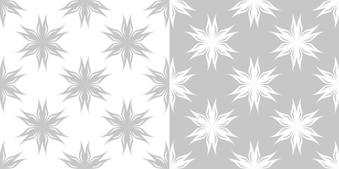 Compilation of gray and white floral patterns. Set of seamless backgrounds