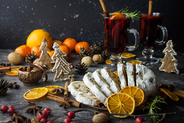 Fototapeta na wymiar Traditional stollen and milled Hot wine cake and Christmas decorations