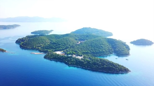 Aerial drone bird's eye view video of iconic island of Skorpios, Lefkada island, Ionian, Greece