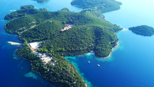 Aerial drone bird's eye view video of iconic island of Skorpios, Lefkada island, Ionian, Greece
