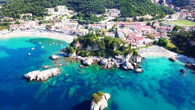 Aerial drone bird's eye view video of iconic and picturesque small fishing village of Parga, Epirus, Ionian, Greece