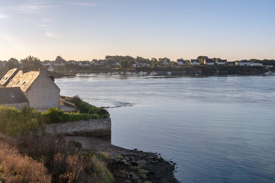 French landscape - Bretagne. A small fishing village in a beautiful bay after sunrise.