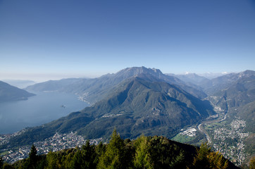 Beautiful View in Summer over Mountains and an Alpine Lake Maggiore in Ticino, Switzerland.