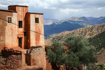 Beautiful old red mud houses in Atlas Mountains in Morocco