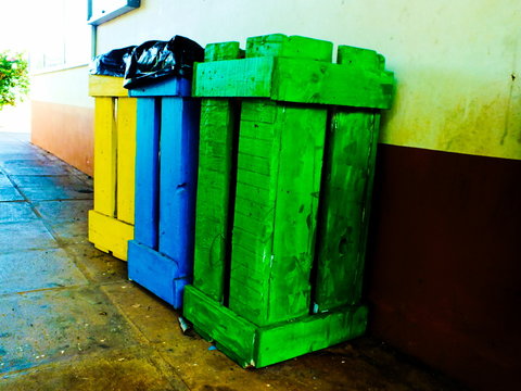 Colorfull trash cans in wood 