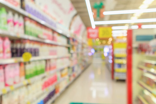Abstract blur supermarket aisle shelves interior defocused background