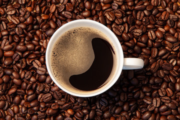 cup of coffee with beans