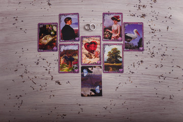 divination cards alignment for love and family with lavender and candle