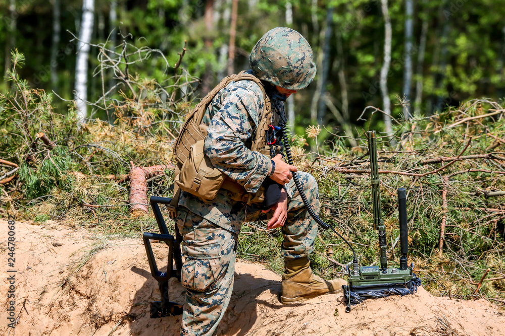 Wall mural Soldiers in military training Saber Strike in Latvia.