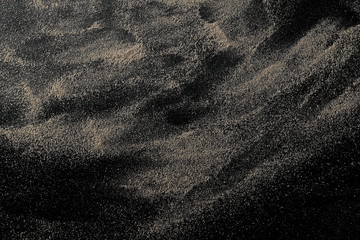 Desert sand isolated on black background and texture, with clipping path, top view