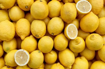 Set of whole lemons and items in a market stall