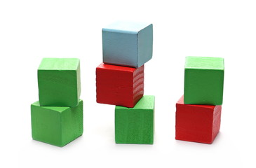 Fototapeta premium Wooden colorful building blocks for children, tower games isolated on white background