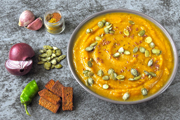 Fresh pumpkin soup in a bowl. Vegan food.