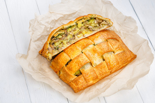Pie with a stuffing mushrooms and potato.