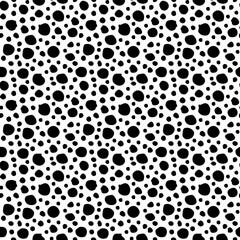 Abstract polka dot pattern with hand drawn dots. Cute vector black and white polka dot pattern. Seamless monochrome polka dot pattern for fabric, wallpapers, wrapping paper, cards and web backgrounds.