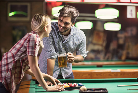 billiard game- Couple beginning billiard game.