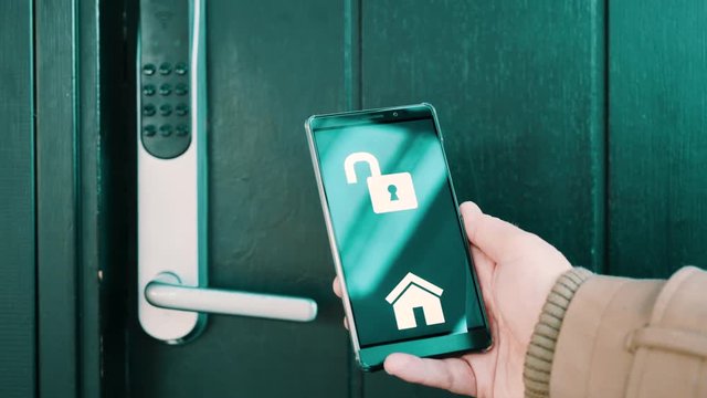 Digital key on mobile phone is used to unlock electronic lock into house