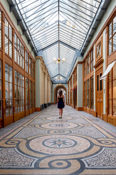 walking inside old galleries in paris