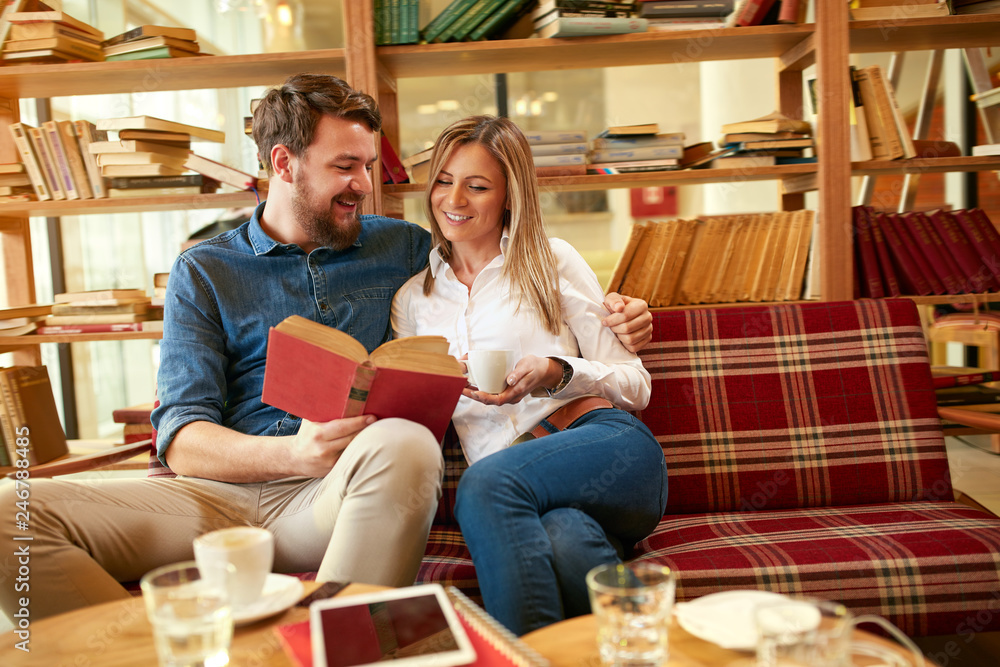 Wall mural Man and woman learn together