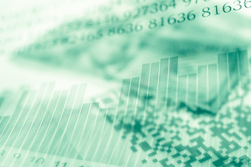 Double exposure Stock market display or forex trading graph and candlestick chart on dollar banknote