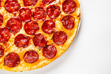 Pepperoni Pizza with Mozzarella cheese, salami, Tomatoes, pepper.