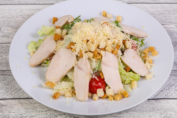 Caesar salad with chicken breast