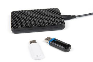 USB key and external hard disk on the white