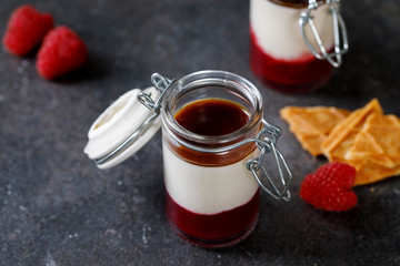 Layered panna cotta with raspberry, vanilla and coffee syrup