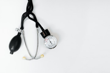 Cardiology. Tonometer and a manometer, stethoscope for diagnosis to measure of blood pressure and...