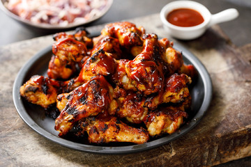 Barbecue chicken wings with sauce - Powered by Adobe