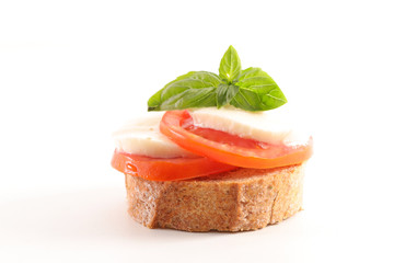 bruschetta with tomato, mozzarella and basil