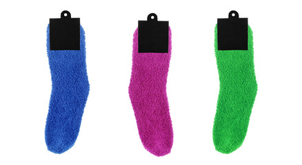 New terry socks with a tag on the blue background
