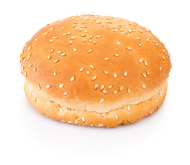 Hamburger bun with sesame seeds isolated on white background