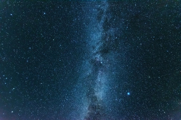 Bright night starry sky with millions of stars and galaxy Milky Way.