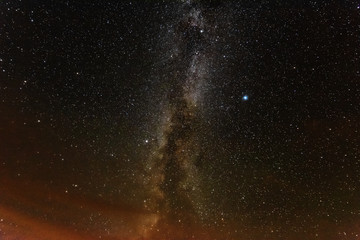 Fototapeta na wymiar Bright night starry sky with millions of stars and galaxy Milky Way.