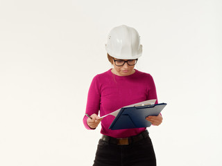 emotional girl foreman in a helmet on a white background.