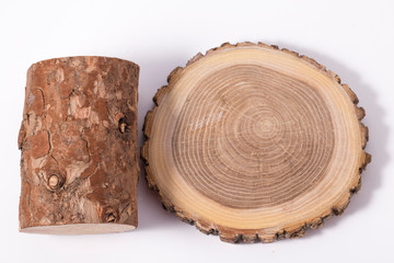 Wooden stump(cut log) isolated. Round cut down tree with annual rings.