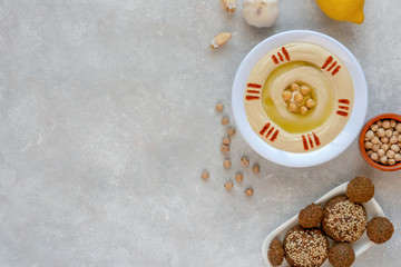 Traditional  hummus  and  falafel on light grey  background