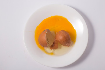 broken egg isolated on a white background