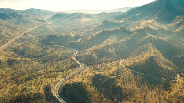 The aerial camera flies 800 feet above the base of Cross Hill and flying backwards to the north while shooting from the rail loop's southern exit. No trains are currently on the rail loop.