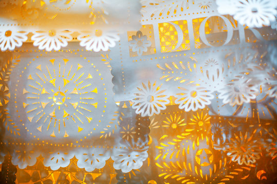 handmade paper curtains on yellow background