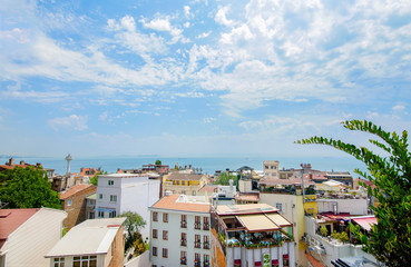 Fatih district in Istanbul, Turkey. view from the roof on the buildings and Marmara sea in the background