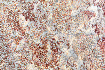 White limestones in Pamukkale. Calcium deposits from thermal springs. The texture of the stone.