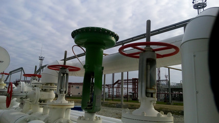 Green pneumatic valve on the pipeline