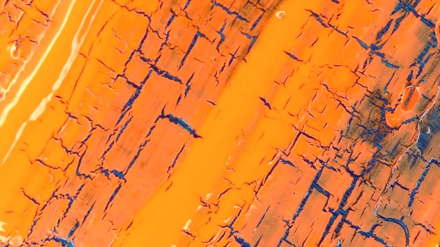 Peeling and cracking paint time lapse. Orange and blue
