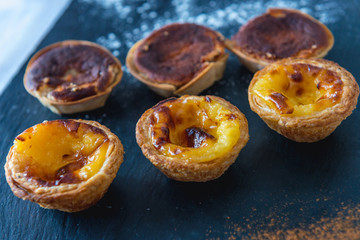Portuguese pastry dusted with cinnamon known as Pastel de Nata