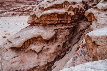 View through a rock arch in the desert of Wadi Rum, Jordan, Middle East