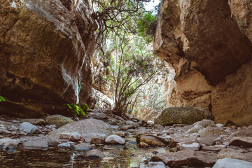 Stuck Hanging Stone in Avakas canyon. Akamas Peninsula landscape. Cyprus landmark